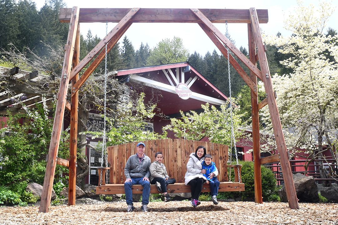 A new giant swing at the entrance to Remlinger Farms Fun Park makes for a good family photo op